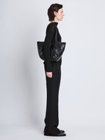 Image of model wearing Large Puffy Nappa Ruched Tote in BLACK