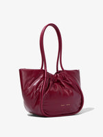 Side image of Large Puffy Nappa Ruched Tote in GARNET