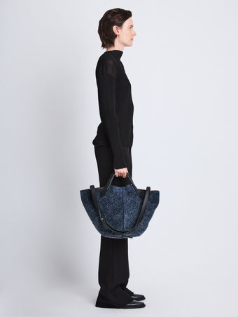 Image of model wearing Large Brushed Suede PS1 Tote in DEEP NAVY