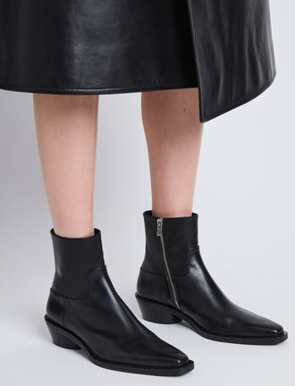 Proenza Schouler image of model wearing Bronco Ankle Boots in black