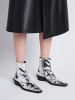 Image of model wearing Bronco Ankle Boots in SILVER