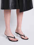 Image of model wearing Spike Flip Flops in BLACK