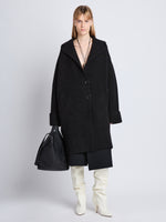 Front image of model wearing Ruth Coat In Knit Outerwear in black