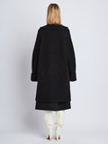 Back image of model wearing Ruth Coat In Knit Outerwear in black