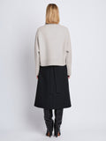 Back image of model wearing Lofty Eco Cashmere Turtleneck Sweater in LIGHT GREY MELANGE