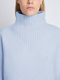 Detail image of model wearing Alma Sweater In Lofty Eco Cashmere in pale blue