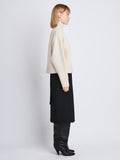 Side image of model wearing Alma Sweater In Lofty Eco Cashmere in ecru