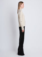 Side image of model wearing Camilla Sweater In Lofty Eco Cashmere in ecru