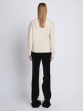 Back image of model wearing Camilla Sweater In Lofty Eco Cashmere in ecru