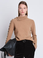 Cropped front image of model wearing Camilla Sweater In Lofty Eco Cashmere in light camel
