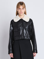 Cropped front image of model in Judd Jacket With Shearling Collar In Leather in black