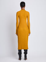 Back image of model wearing Carmen Dress In Midweight Viscose Rib in gold