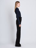 Side image of model wearing Carla Sweater In Midweight Viscose Rib in midnight