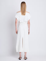 Back full length image of model wearing Rosa Off The Shoulder Dress in WHITE