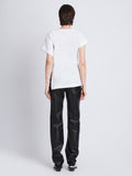 Back full length image of model wearing Hopper T-Shirt in WHITE