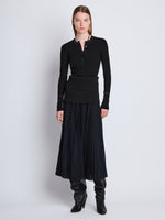 Front full length image of model wearing Agnes Henley Sweater in BLACK