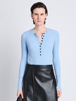 Front cropped image of model wearing Agnes Henley Sweater in LIGHT BLUE