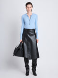 Front full length image of model wearing Agnes Henley Sweater in LIGHT BLUE