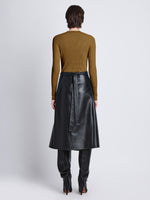 Back image of model wearing Agnes Henley Sweater In Eco Superfine Merino in tobacco