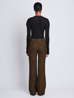 Back full length image of model wearing Barbara Pant In Textured Wool Twill in DARK LODEN