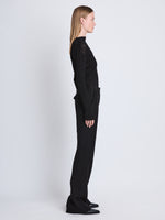 Side full length image of model wearing Barbara Pant In Textured Wool Twill in BLACK