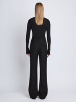 Back full length image of model wearing Barbara Pant In Textured Wool Twill in BLACK