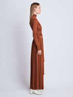 Side full length image of model wearing Meret Dress in TOBACCO