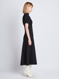 Side full length image of model wearing Tracey Dress in BLACK