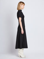 Side full length image of model wearing Tracey Dress in BLACK