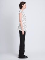 Side full length image of model wearing Stella Top in WHITE MULTI