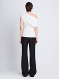 Back full length image of model wearing Francesa Off The Shoulder Top in WHITE