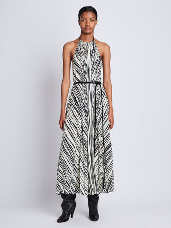 Front full length image of model wearing Frida Halter Dress In Printed Sheer Pleated Chiffo in ECRU MULTI