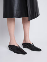 Image of model wearing Bronco Mules in BLACK