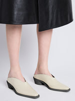 Image of model wearing Bronco Mules in CREAM