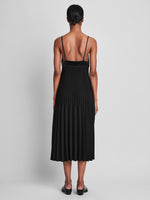 Back image of model wearing Wren Dress In Pleatable Crepe in black