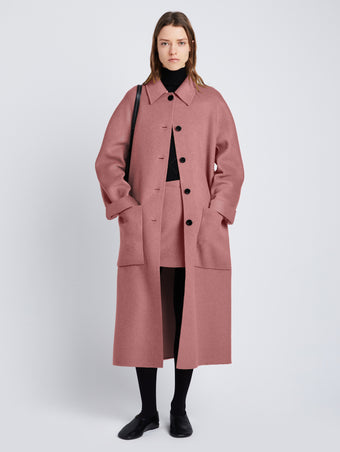 Front image of model in Melton Wool Coat in Dusty Pink Melange