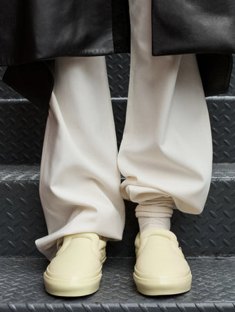 Image of model wearing Vans x Proenza Schouler Puffy Slip-On Shoes in resin