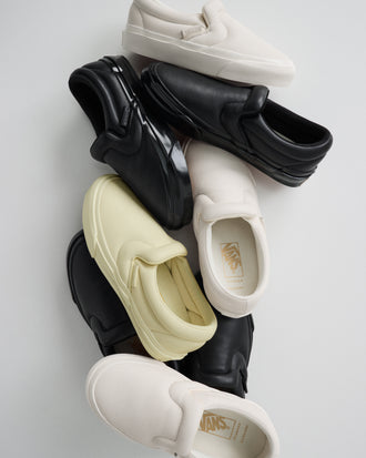 Pile of Vans x Proenza Schouler Puffy Slip-On Shoes in resin, black. and ecru