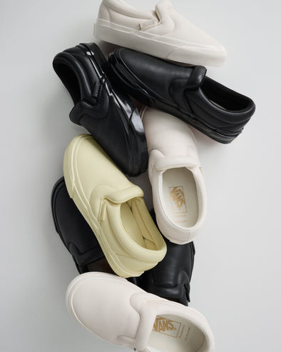 Pile of Vans x Proenza Schouler Puffy Slip-On Shoes in resin, black. and ecru