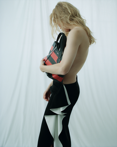 Proenza Schouler Side image of model wearing Cella Skirt in Matte Double Crepe in BlackIvory 