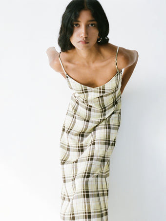 Proenza Schouler Editorial image of model wearing the Evelyn Dress in Crinkle Gauze in Straw Multi