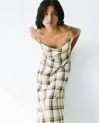 Proenza Schouler Editorial image of model wearing the Evelyn Dress in Crinkle Gauze in Straw Multi