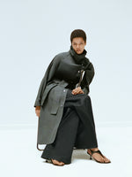 Proenza Schouler Editorial Image of model wearing Corey Trench in Washed Cotton in Willow with the Coralie Pant in Poplin in Black with the Tee Thong Sandal in Black