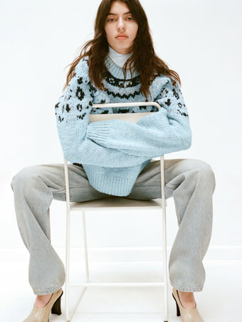 Proenza Schouler White Label Campaign Image of model wearing Lizzy Sweater in Fairisle in Pale Blue Multi