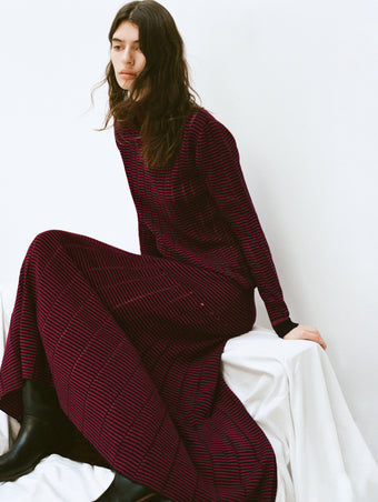 Proenza Schouler White Label Campaign image of model wearing the Stina Turtleneck in Ladderstrip in Wine