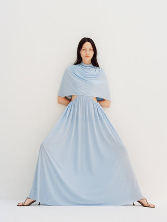 Image of model wearing Frankie Dress in Matte Jersey in sky
