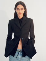 Cropped image of model wearing Lark Blazer in black and Ellsworth Jeans in classic wash