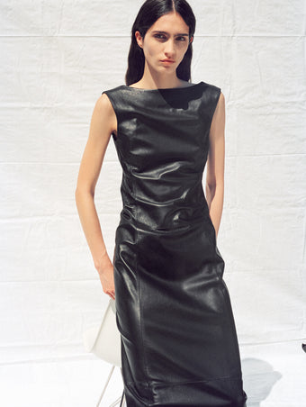 Image of model wearing Backless Leather Dress in black