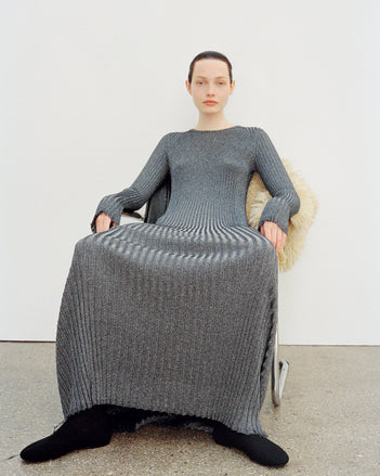 Image of model wearing Joni Dress in Metallic Rib in silver