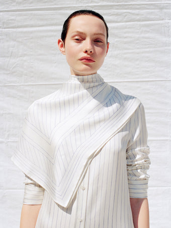 Cropped image of model wearing Hannah Dress in Stripe Silk Twill in ivory multi